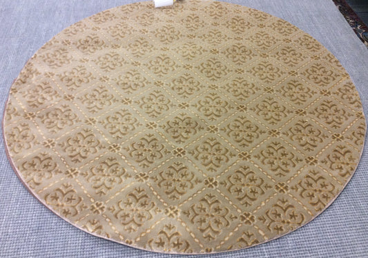 Machine Woven Polyester Blend Kane Champagne Carved Round Rug (5'Rd)