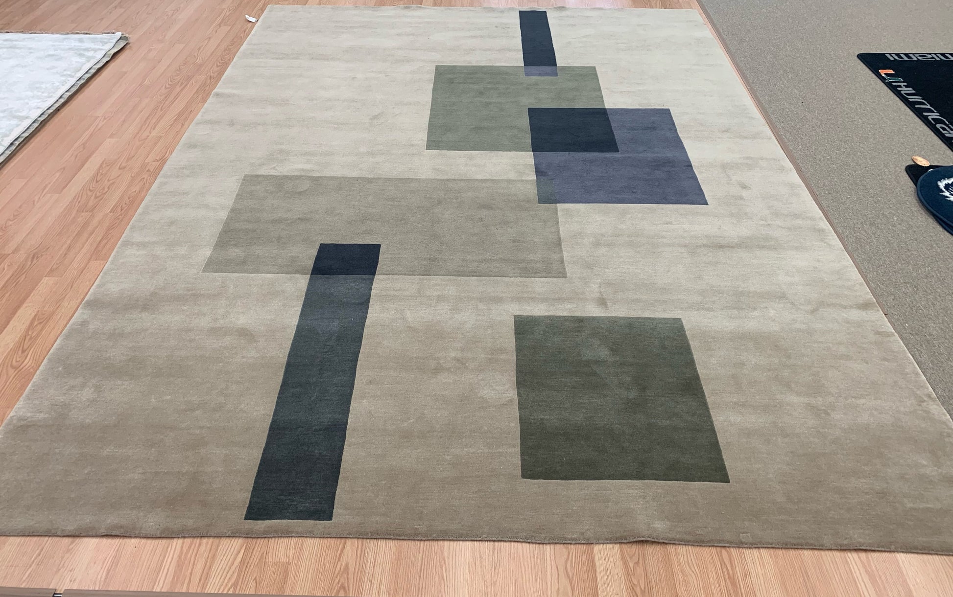 Vertical image of Hand-Knotted Wool Deco Tibetan Rug - Luxurious hand-knotted wool rug with intricate deco Tibetan design.